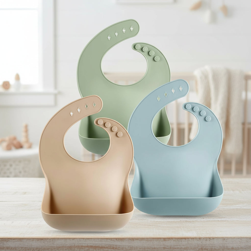 Babero para bebé de silicona ajustable e impermeable para la alimentación