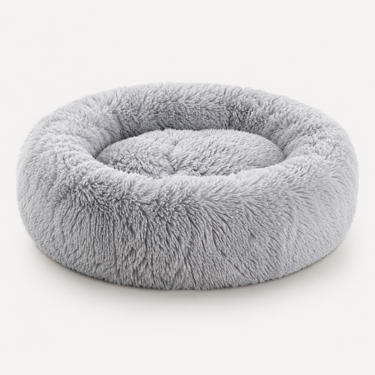 Beroligende hundeseng i plys med hyggeligt design, maskinvaskbar