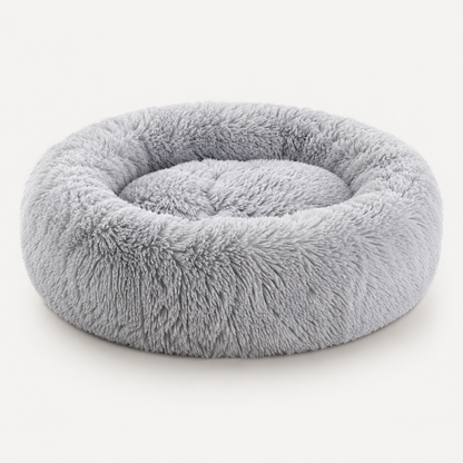 Beroligende hundeseng i plys med hyggeligt design, maskinvaskbar