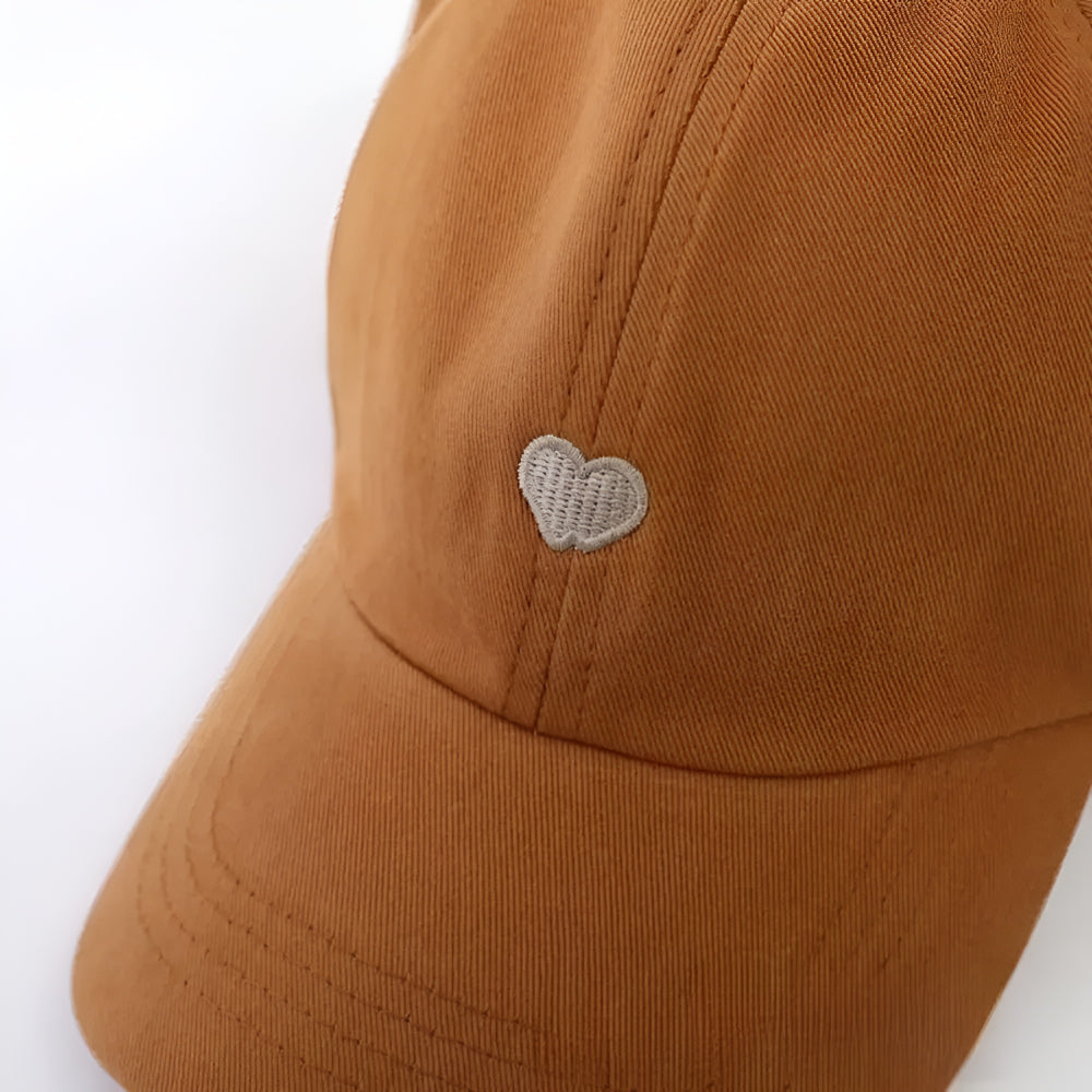 Cappellino estivo per bambini con protezione solare e apertura per coda di cavallo